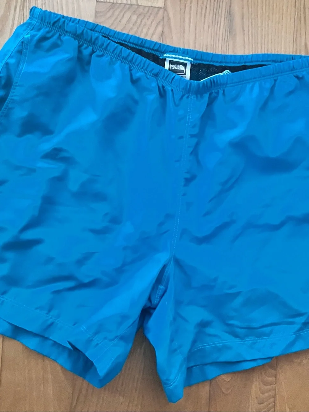 The North Face womens running shorts size medium green